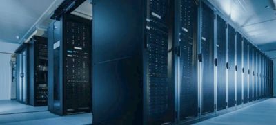 Rows of server racks in a data centre aisle