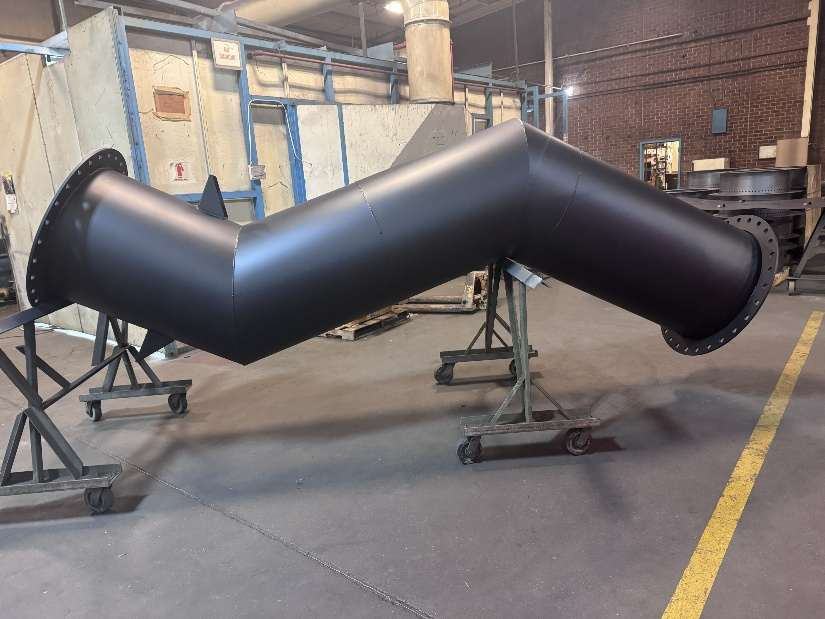 Large mitered exhaust elbow with flanged ends, finished in high-heat black